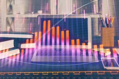 Finansal grafik renkli çizimler ve arka planda bilgisayar olan tablolar. Çifte maruziyet. Uluslararası pazarlar kavramı.