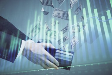 Finansal grafiğe çoklu pozlama hologram, Amerikan dolarları ve insan eli. Analiz kavramı.