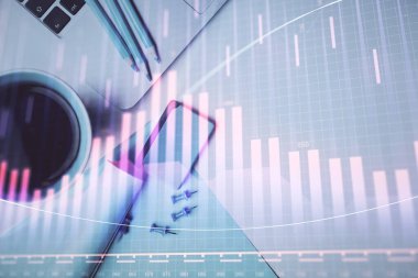 Bilgisayarla masaüstü arkaplanı üzerinde ön x grafik çizimi çift pozlama. Finansal analiz kavramı. Üst görünüm.