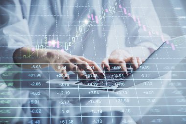 Bilgisayarda ve ön x grafik hologram çiziminde kadın eli yazarken çift pozlama. Borsa yatırım kavramı.