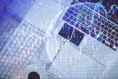 Finans piyasası grafiği ve masaüstü bilgisayarının üst görüntüsü. Çoklu maruz kalma. Yatırım kavramı.