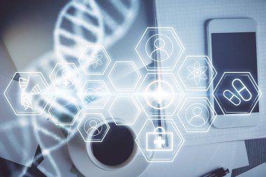 Telefonunla masanın üzerine DNA çizimi yapılmış. Üst Manzara. Bilim eğitimi kavramı.