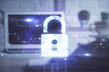 Bilgisayar ve ikon hologramı ile masaüstüne çift pozlama. Veri güvenliği kavramı.