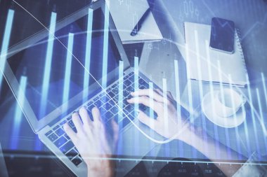 Bilgisayarda ve ön x grafik hologram çiziminde kadın eli yazarken çift pozlama. Borsa yatırım kavramı.