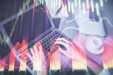 Bilgisayarda ve ön x grafik hologram çiziminde kadın eli yazarken çift pozlama. Borsa yatırım kavramı.