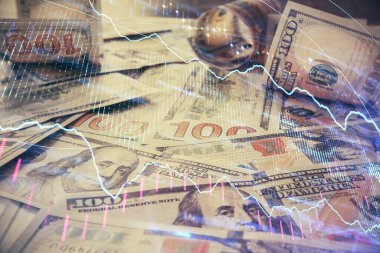 Forx grafiğinin çok sayıda görüntüsü bize dolar banknotları arka planında görünüyor. Finansal başarı piyasası kavramı.