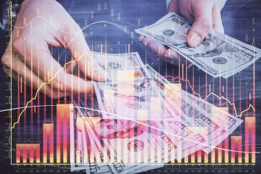 Finansal grafiğe çoklu pozlama hologram, Amerikan dolarları ve insan eli. Analiz kavramı.