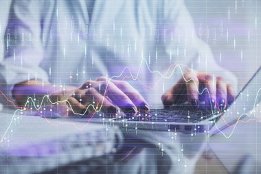 Bilgisayarda ve ön x grafik hologram çiziminde kadın eli yazarken çift pozlama. Borsa yatırım kavramı.