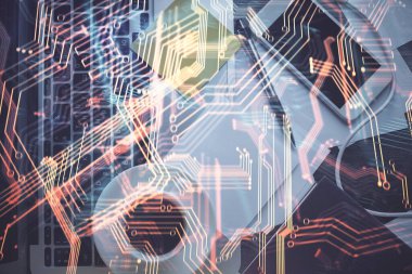 Teknoloji hologramı masaüstü arka planında bilgisayarın üzerine çiziyor. Üst Manzara. Çifte maruziyet. Teknoloji kavramı.