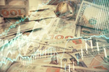 Forx grafiğinin çok sayıda görüntüsü bize dolar banknotları arka planında görünüyor. Finansal başarı piyasası kavramı.
