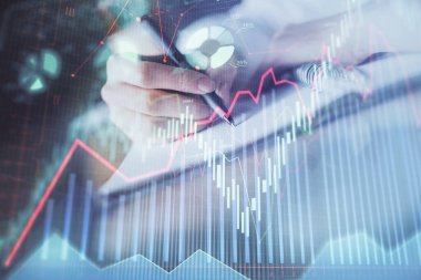 Finansal Forex grafik eller notları arka plan alarak görüntülenir. Araştırma kavramı. Çift Pozlama