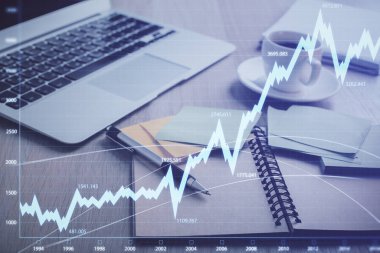 Önx grafik çizimi ve masaüstü ile kahve ve masa arkasındaki öğelerin çoklu pozlandırılması. Finansal piyasa ticareti kavramı
