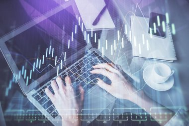 Bilgisayarda ve ön x grafik hologram çiziminde kadın eli yazarken çift pozlama. Borsa yatırım kavramı.