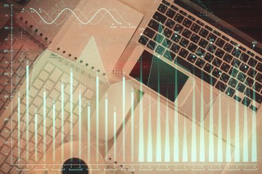 Finans piyasası grafiği ve masaüstü bilgisayarının üst görüntüsü. Çoklu maruz kalma. Yatırım kavramı.