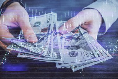 Finansal grafiğe çoklu pozlama hologram, Amerikan dolarları ve insan eli. Analiz kavramı.