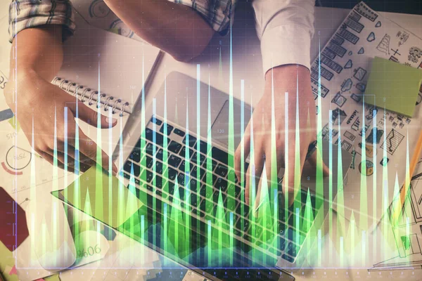 stock image Double exposure of man and woman working together and forex graph hologram drawing. Financial analysis concept. Computer background. Top View.