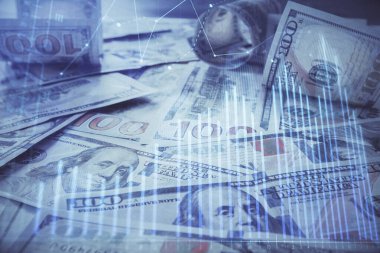 Forx grafiğinin çok sayıda görüntüsü bize dolar banknotları arka planında görünüyor. Finansal başarı piyasası kavramı.