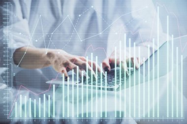 Bilgisayarda ve ön x grafik hologram çiziminde kadın eli yazarken çift pozlama. Borsa yatırım kavramı.