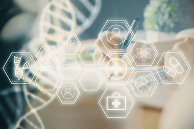 DNA temalı hologram, arka plan yazan kadınların ellerinde. Eğitim kavramı. Çift pozlama