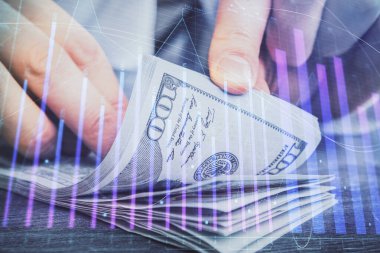 Forx grafiği, hologram, Amerikan dolarları ve insan eli çizimleri. Teknik Analiz kavramı.