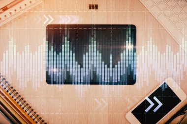 Forx grafik hologramının telefonlu hali. Üst Manzara. Mobil ticaret platformu kavramı.