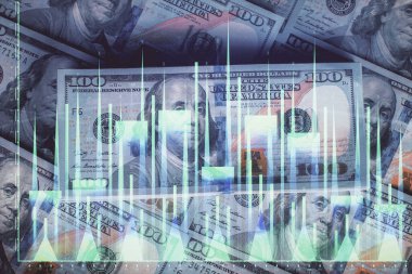 Forx grafiğinin çok sayıda görüntüsü bize dolar banknotları arka planında görünüyor. Finansal başarı piyasası kavramı.