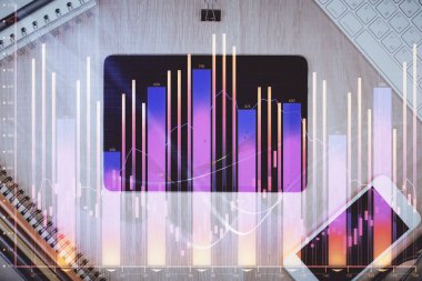 Forx grafik hologramının telefonlu hali. Üst Manzara. Mobil ticaret platformu kavramı.