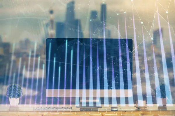 株式市場のグラフとコンピュータの背景を持つテーブル 多重露光 金融分析の概念 ロイヤリティフリーのストック画像