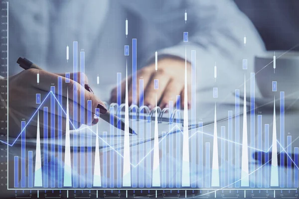 stock image Double exposure of woman's hands making notes with forex graph hologram. Concept technical analysis.