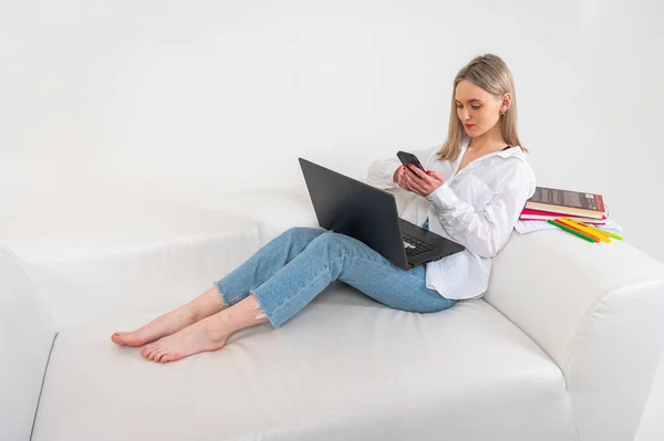 Young Emotional Girl Sitting Laptop Sofa Isolated Light Background Girl — Stock Photo, Image