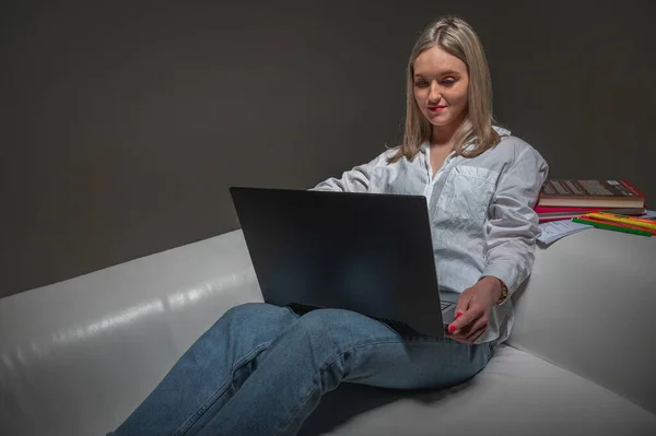 Young Emotional Girl Sitting Laptop Sofa Isolated Light Background Girl — Stock Photo, Image
