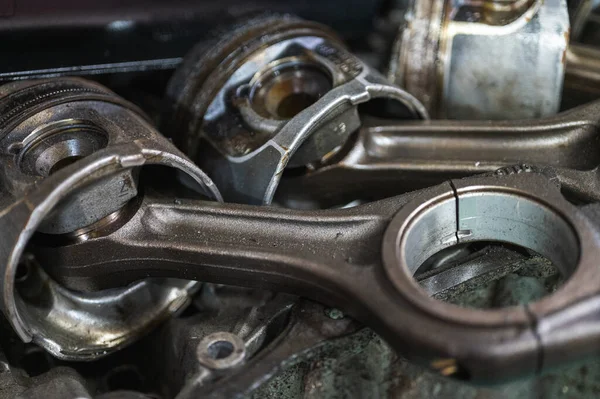 Stock image Close-up of a disassembled, engine, part of the automatic transmission box of a car on a machine in a garage or repair factory station for repair or maintenance. Detail. Close up view