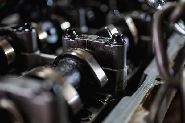 Stock image Close-up of a disassembled, engine, part of the automatic transmission box of a car on a machine in a garage or repair factory station for repair or maintenance. Detail. Close up view