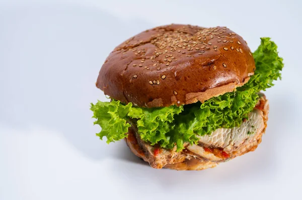 Various hamburgers, meat burgers for restaurant menu on white background. Isolated, close up view