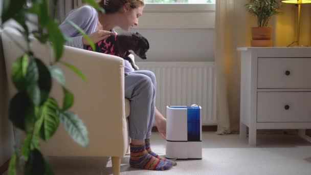 Pretty Young Woman Small Dog Her Arms Turns Modern Humidifier — Stock Video