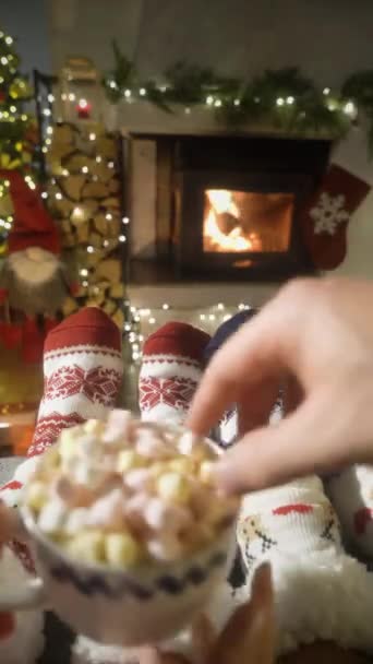 Couple Enjoying Cocoa Marshmallows Warm Fireplace Warming Feet Woolen Socks — Stock Video