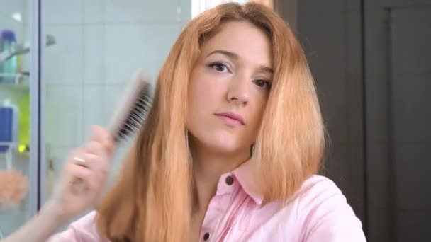 Attractive Young Woman Brushing Her Thick Beautiful Hair Comb While Video Clip