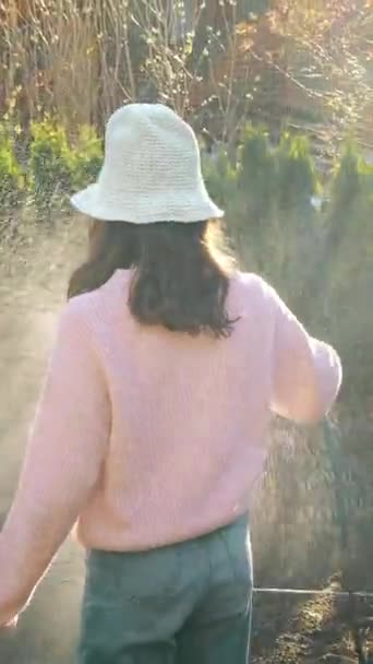 Teenage Girl Gardener Watering Garden Hose Sunny Spring Evening Rays — ストック動画