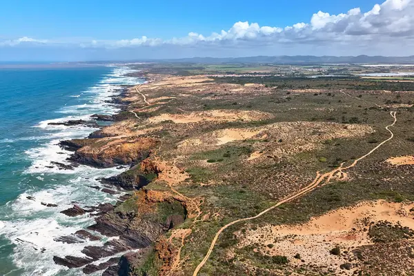 Aerial panoramic view of the Rota Vicentina or Fishermens, Fisherman, Trail in spring. Almograve, Portugal