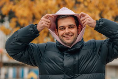 young man in warm clothes in winter