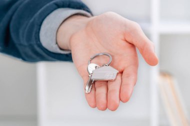 hand with keychain with keys