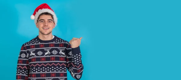 Isolated Young Man Christmas Clothes Santa Claus Hat Blue Background — Photo