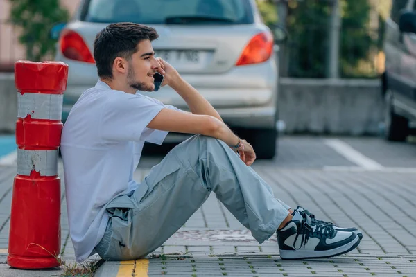 Teenager Street Sitting Mobile Phone Smartphone — Foto Stock