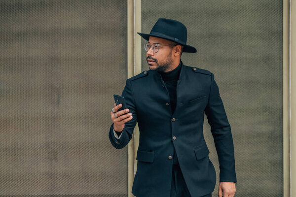 man with mobile phone in the street