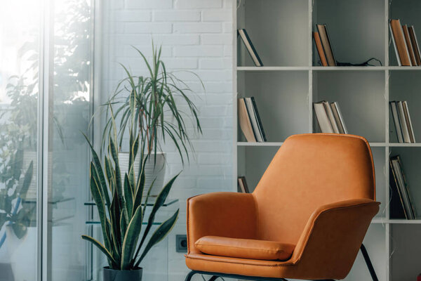 interior of house with sofa in the living room next to the window