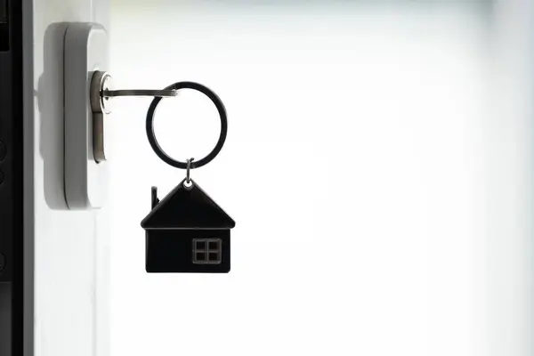 Silhouette Des Hausschlüssels Türschloss lizenzfreie Stockbilder