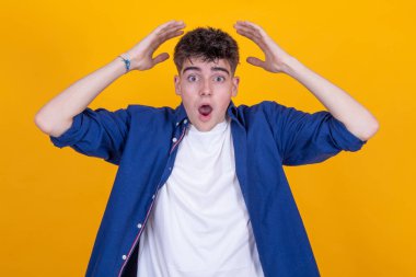 boy isolated on background with surprised expression