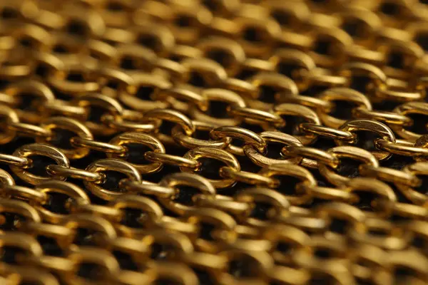 Işıldayan Metalik Bir Kaplama Ile Karmaşık Altın Zincir Halkalarının Yakın - Stok İmaj