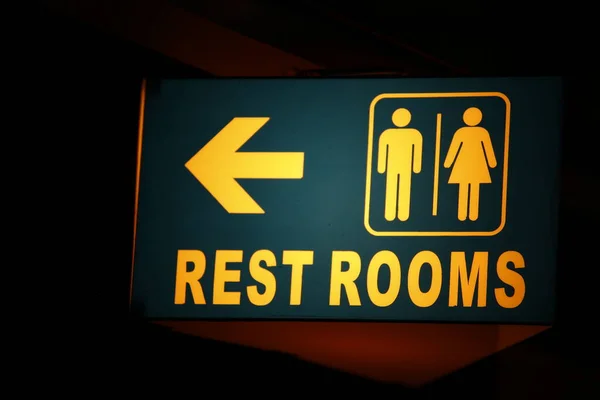 Rest Rooms Toilet Sign With Man And Women Symbols