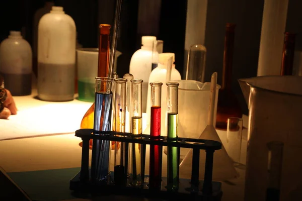 Chemicals in a dark laboratory